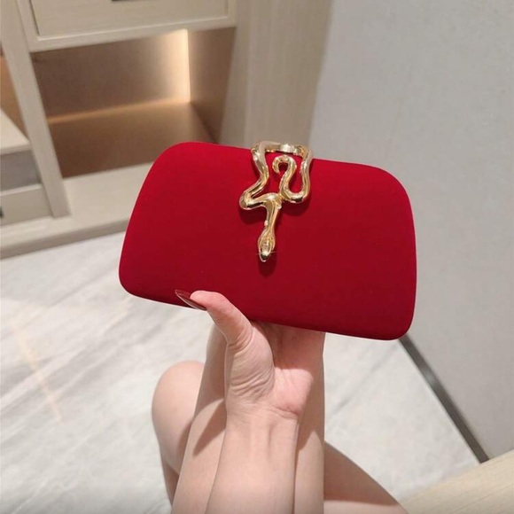 Elegant Red Clutch with Gold Snake Design  Accent